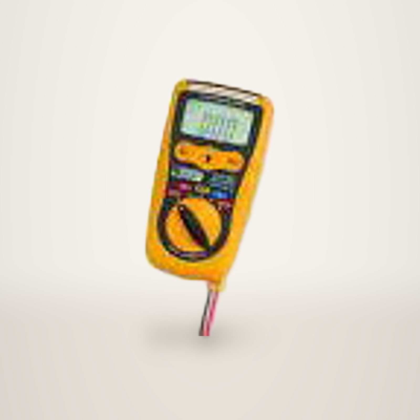 Un multimètre numérique compact jaune et noir, avec écran LCD et molette centrale, posé devant ses deux cordons de test rouge et noir sur fond blanc.